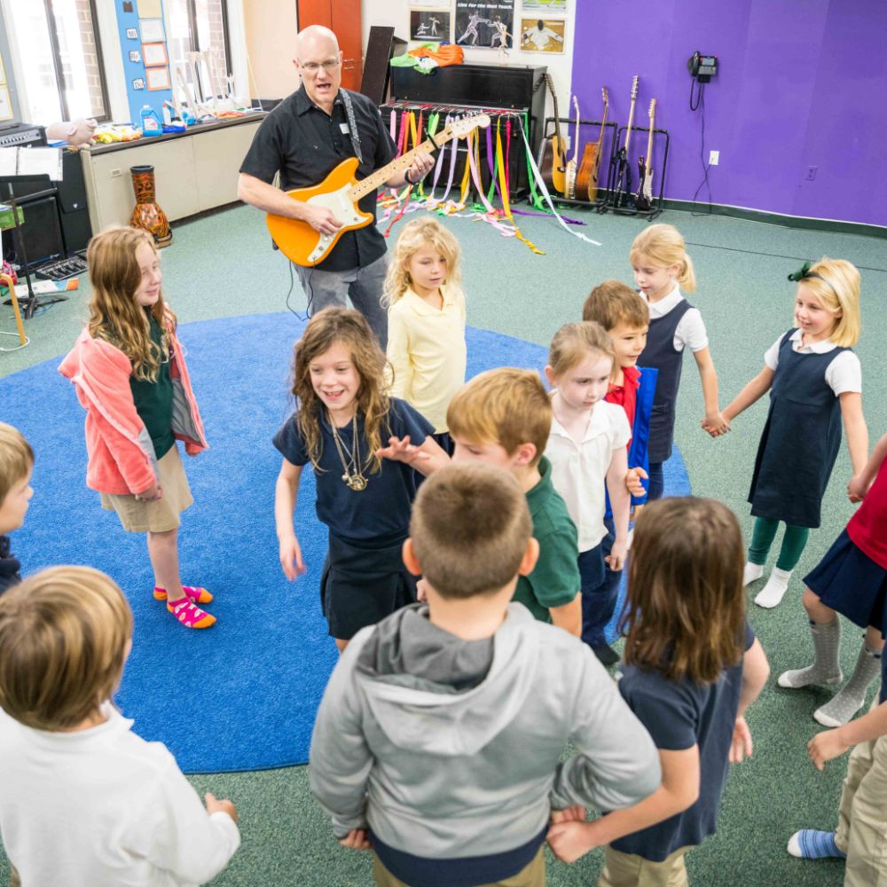 photo of students learning with music